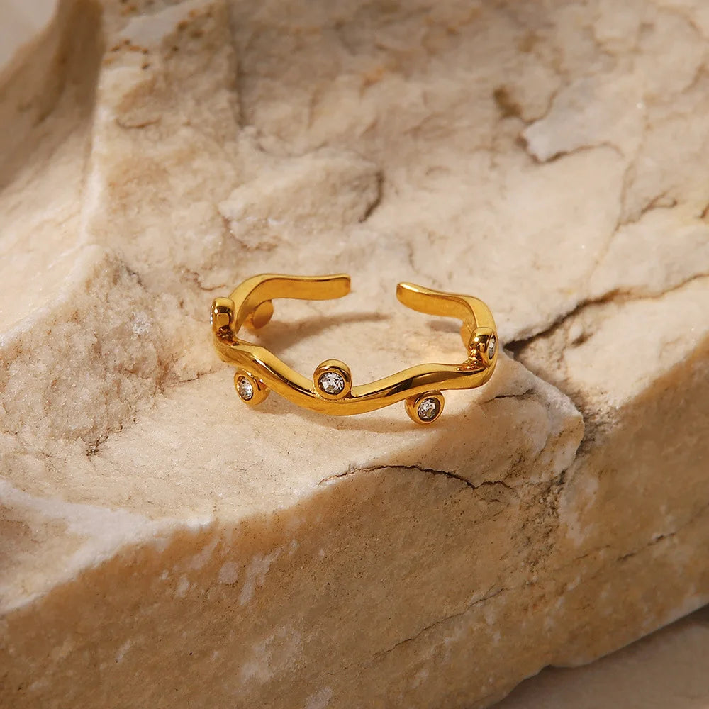 Gold Joree ring with sparkling accents, adding a vibrant touch to your style and uplifting your everyday look.