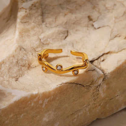 Gold Joree ring with sparkling accents, adding a vibrant touch to your style and uplifting your everyday look.
